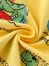 Yellow printed crew neck kids t-shirt with dinosaur print, machine wash cold