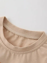 Children’s rocket ship embroidered t-shirt, beige cotton with lace trim