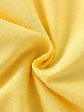 Vibrant yellow knit ruffle hem unicorn graphic t-shirt, machine wash cold