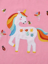Children’s unicorn short sleeve t-shirt with embroidered unicorn, rainbow mane, flowers, bees on pink fabric. Machine wash cold, tumble dry low
