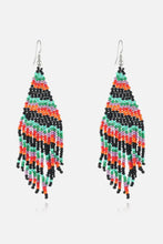 Festive Christmas beaded earrings with multicolored fringe and silver hooks