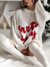 White knit oversized sweater dress with red Santa Baby lettering
