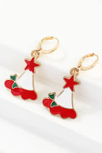 Red and green Christmas theme alloy earrings with Santa Claus charms and gold accents