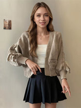 Chunky knit long sleeve tie cardigan in earth tone with ruffles
