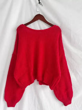 Chunky knit tie-front cardigan in vibrant red with puffed sleeves