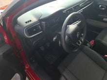 Citroen C3 PureTech Feel red car interior with dashboard and seats