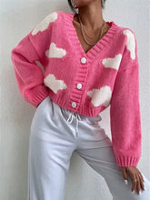 Pink slightly stretchy cloud button knit cardigan with white clouds
