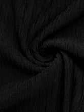 Black crinkled cotton cold shoulder flounce sleeve bodysuit with a soft textured surface and shoulder flounce detail