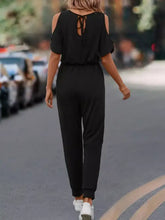 Black cold-shoulder jumpsuit back with tie detail, machine wash cold