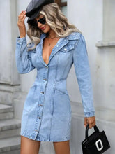 Light blue denim dress with collared neck button-up front and long sleeves in soft denim fabric
