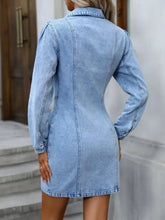A light blue denim dress with long sleeves and a collared neck button-up front for stylish casual wear