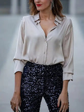 Beige cream satin collared neck button up shirt with rolled sleeves and elegant button details