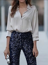 Collared neck cream satin button up shirt with rolled up sleeves in a beige satin fabric for elegant wear