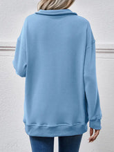 Light blue collared neck dropped shoulder sweatshirt with ribbed hem
