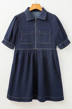 Denim dress with collared neck half zip featuring short puffed sleeves and two front pockets in blue denim material