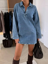 Blue denim dress with collared neck and long sleeves showcasing a classic long sleeve denim design