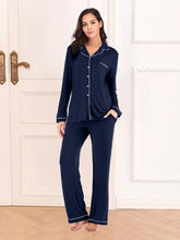 Navy blue collared neck long sleeve loungewear set with white piping details and pockets, featuring full sleeve length