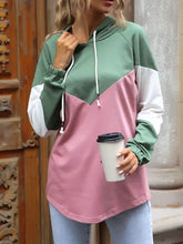 Color block casual long sleeve hoodie in sage green and dusty pink with white sleeves made of slightly stretchy material