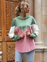 Color block casual long sleeve hoodie with green white and pink geometric pattern and slightly stretchy fabric for machine wash