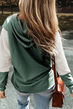 Olive green and white color block dropped shoulder hoodie with hood and ribbed cuffs