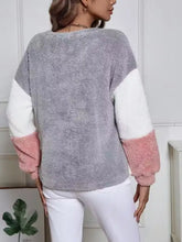 Color block fuzzy knit sweatshirt with gray body white shoulders and pink cuffs care instructions include tumble dry safe