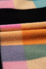 Multicolored wool scarf with black border on color block long sleeve hoodie
