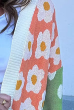 Color block open front cardigan with orange green floral scarf and white daisies