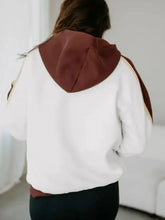 Color block patchwork hooded sweatshirt in soft fleece with slightly stretchy fabric and machine wash convenience