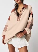 Beige and rust color block striped Johnny collar sweatshirt with patchwork design, machine wash cold recommended