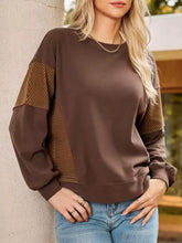 Brown color block casual sweatshirt with gold-striped sleeve panels made for machine wash cold care