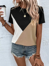 Women’s short-sleeve color block t-shirt in black, white, tan geometric panels