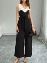 Black and white color block wide leg jumpsuit with v-neckline