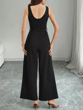 Color block wide leg jumpsuit with black sleeveless design and back cutout