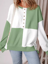 Colorblock henley oversized sweatshirt with bold green and white design and wooden buttons machine wash care instructions