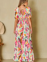 Colorful abstract printed surplice short sleeve maxi dress with open back tie