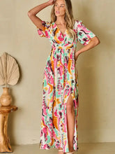 Colorful abstract printed surplice short sleeve maxi dress with V-neck and slit