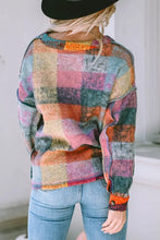 Multicolored plaid patchwork button-up top with long sleeve length