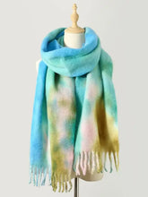 Colorful tie-dye polyester scarf in blue, green, pink, yellow with fringed ends
