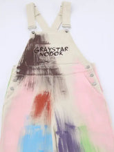 Colorful Wide Leg Overalls in beige canvas with vibrant paint splatter, machine wash cold