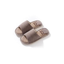 Open toe flats slippers with brown textured straps and light insoles
