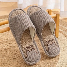 Pair of grey striped open toe flats slippers with Comfort label and bear paw design