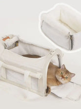 Breathable pet carrier bag with cream exterior, mesh sides, fleece interior