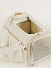 Breathable pet carrier bag with beige mesh panels and soft fabric exterior