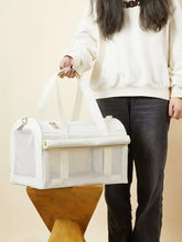 White breathable pet carrier bag with mesh, sturdy handles, roll-top