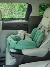 Comfortable portable pet car nest in mint green with padded armrests