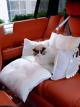 White plush pet car seat carrier with lace trim and cushioned interior