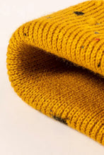 Folded marigold yellow cuff beanie with colorful flecks