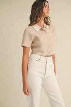 Beige contrast collared knit shirt with mable buttons and jeans