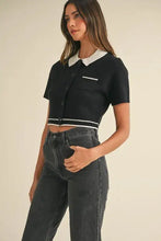 Black contrast collared knit cropped polo with mable button and pocket