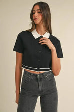 Black contrast collared knit cropped polo with mable button details